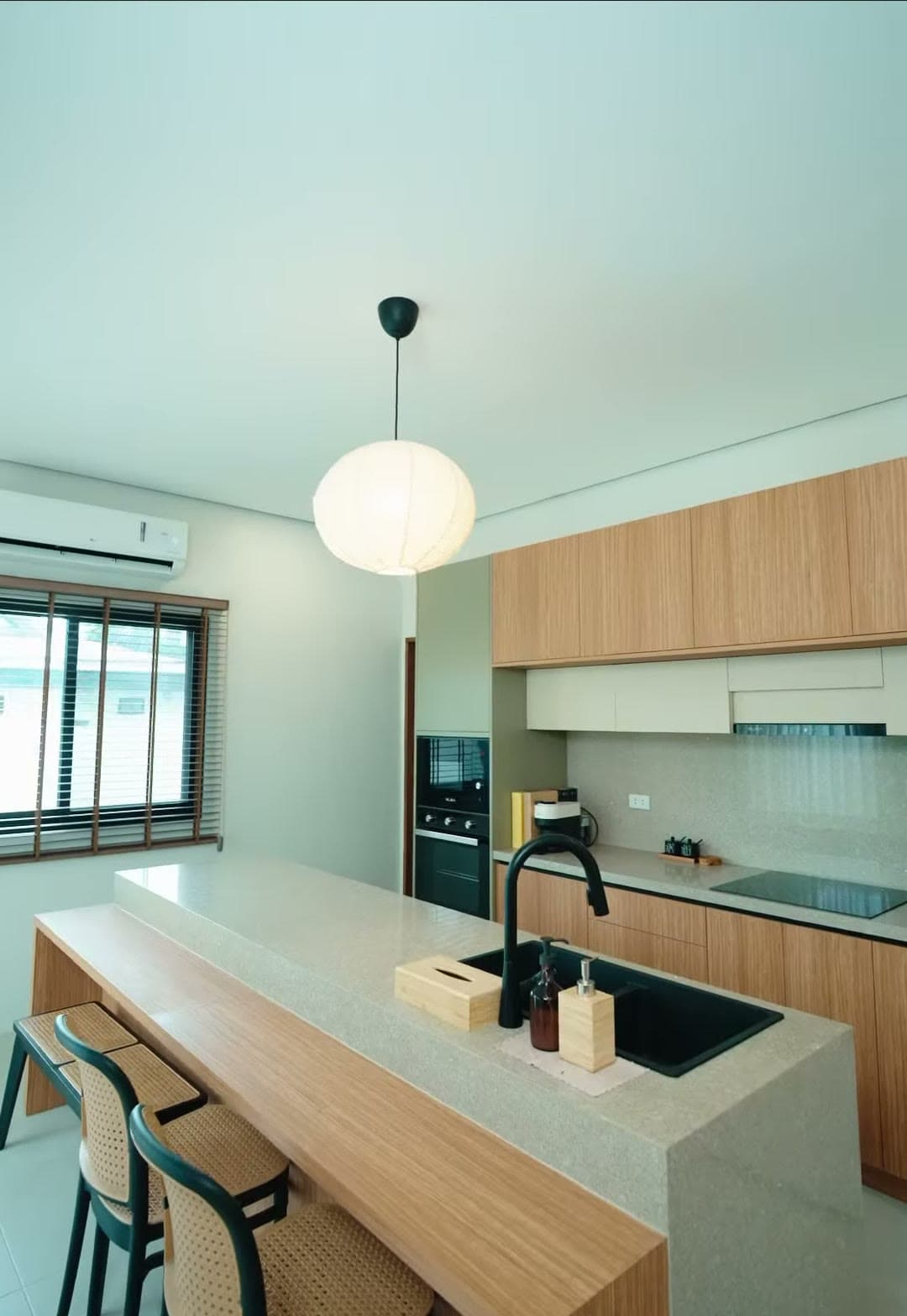 Kitchen with island and pendant light